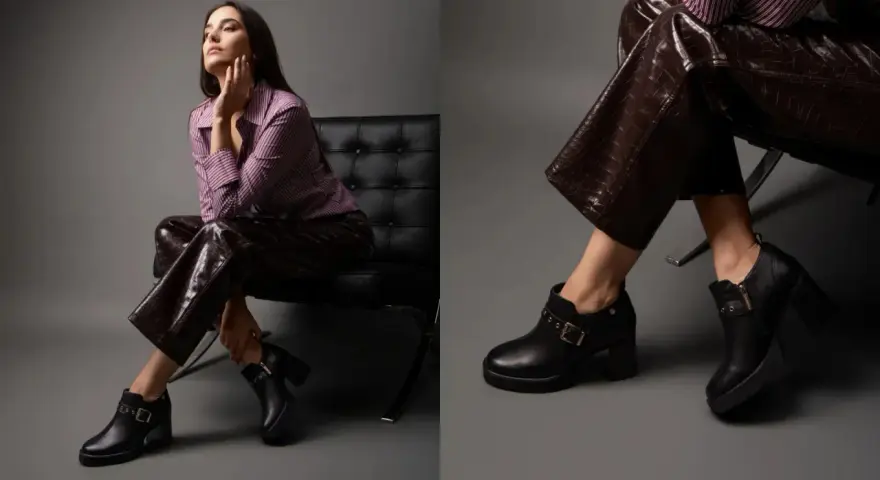Outfits: mujer con botines negros y pantalones de efecto piel. Un look moderno para lucir botines con vaqueros.